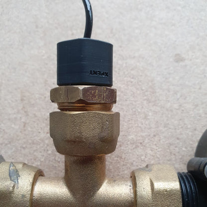 SUPION with its brass connector on a plumbing system